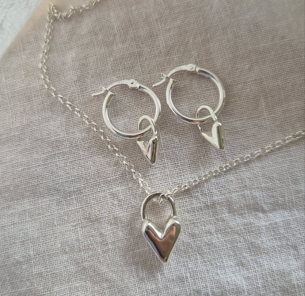 Huggie hoops with Sandcast Heart charms