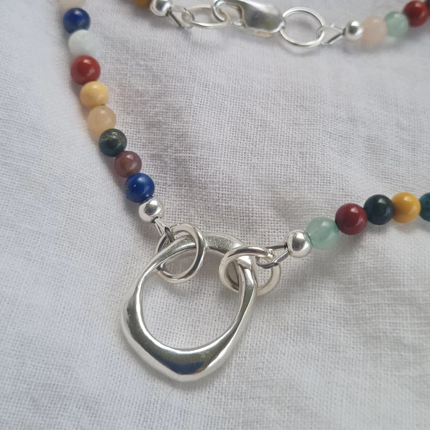 Organic Sandcast Loop Pendant with mixed Gemstones